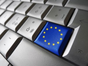 European Union and EU community parliament concept with EU flag on a computer key.